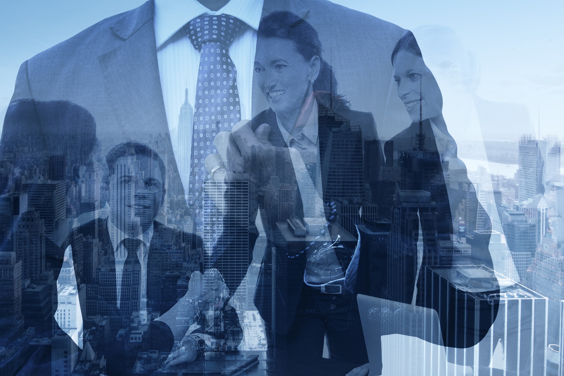 Business people with a blue overlay and a city background.